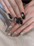 Velvet Veil silver cat-eye press-on nails with textured diamond dust French tips on hand