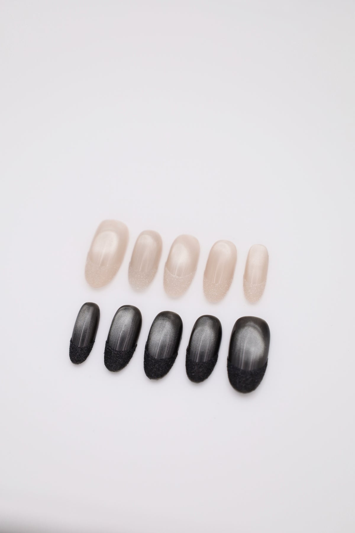 Velvet Veil silver cat-eye press-on nails set with textured glitter French tips display